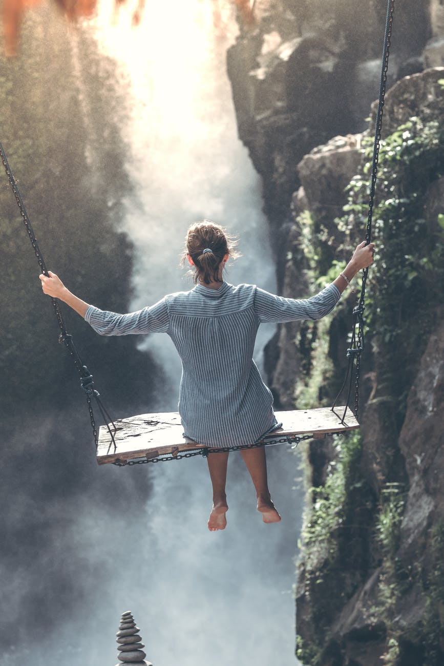 woman wearing grey long sleeved top photography